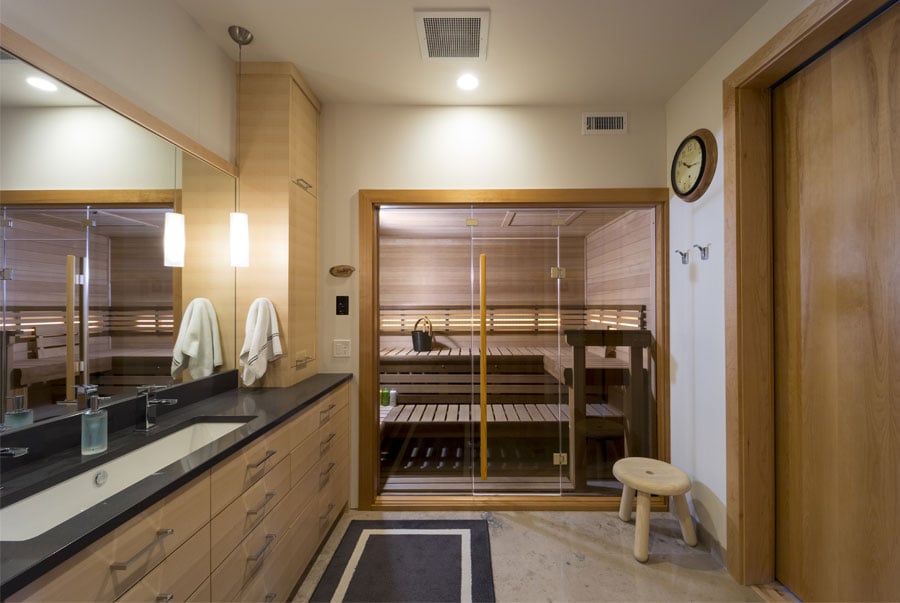 Elevated master bath suite with sauna